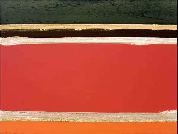 Evaporation ponds for the commercial extraction of sea salt - showing the bright resulting colours - Near Swakopmund - Namib Desert - Atlantic Coast - Namibia - Africa