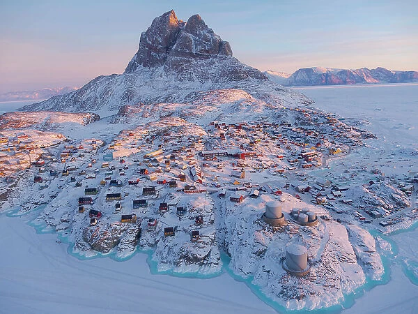 Town Uummannaq during winter in northern West Greenland beyond the Arctic Circle. Greenland, Danish territory Date: 05-03-2020