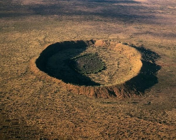 Wolfe Creek meteor crater, aerial second largest meteorite crater in Australia and about 25 million years old, Wolfe Creek Crater National Park, Kimberley region, Western Australia JPF43546