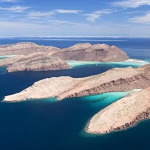 Baja California South, and Sea of Cortez, Mexico: Aerial view of two islands of the Bay of La Paz: Espiritu Santo and Partida, separated by a narrow channel