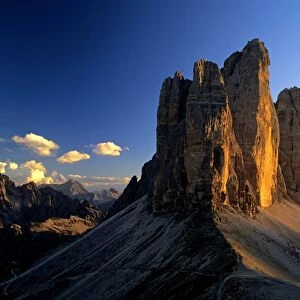 Three Pinnacles, Tre Cime di Lavoro view from Patern Saddle at sunset National Park Dolomiti di Sesto, Dolomites, South Tyrol, Alps, Italy