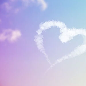 Sky Writing - heart written in the sky against clouds