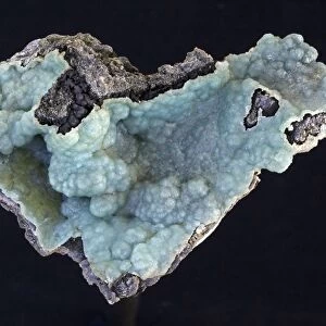 Smithsonite (zinc carbonate - ZnCO3) - Choix Sinoloa Mexico - A mineral ore of zinc - Also known as zinc spar - Discovered by and named for James Smithson whose bequest established the Smithsonian Institute - Colors range from white - grey - yellow