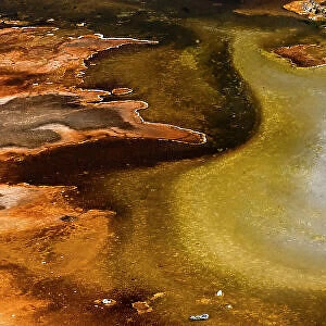 USA, Wyoming. Colorful abstract designs of hydrothermal pools near Great Fountain Geyser, Yellowstone National Park. Date: 29-09-2020