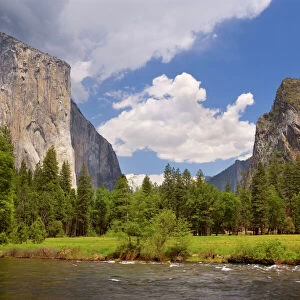 Yosemite Valley with Merced River in the foreground, Bridal Veil Falls on the right hand side and the sheer granite face of El Capitan on the left hand side. In spring - Yosemite National Park, California, USA