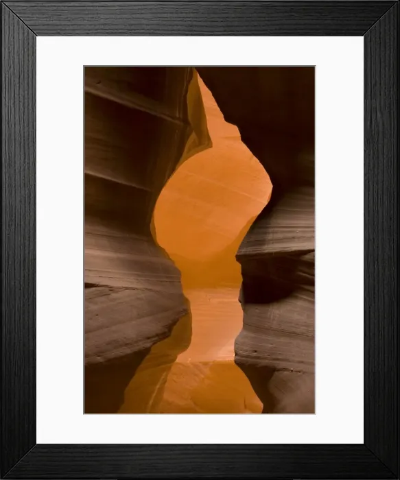 Framed Print : USA - Light that penetrates into the narrow canyon walls creates beautiful hues on the graceful curves of sandstone rock in the Upper Antelope Canyon, probably the most famous slot canyon in the Southwest. Antelope Canyon Framed Print : USA - Light that penetrates into the narrow canyon walls creates beautiful hues on the graceful curves of sandstone rock in the Upper Antelope Canyon, probably the most famous slot canyon in the Southwest. Antelope Canyon