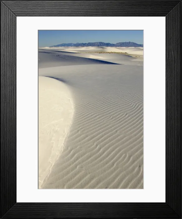 Framed Print : USA - The glistening dunes of White Sands in the Tularosa Basin are not sand, but fine gypsum, deposited on an ancient seabed 250 million years ago. Gypsum, a form of calcium sulfate, is water soluble and washes away Framed Print : USA - The glistening dunes of White Sands in the Tularosa Basin are not sand, but fine gypsum, deposited on an ancient seabed 250 million years ago. Gypsum, a form of calcium sulfate, is water soluble and washes away