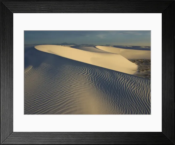 Framed Print : USA - The glistening dunes of White Sands in the Tularosa Basin are not sand, but fine gypsum, deposited on an ancient seabed 250 million years ago. Gypsum, a form of calcium sulfate, is water soluble and washes away Framed Print : USA - The glistening dunes of White Sands in the Tularosa Basin are not sand, but fine gypsum, deposited on an ancient seabed 250 million years ago. Gypsum, a form of calcium sulfate, is water soluble and washes away