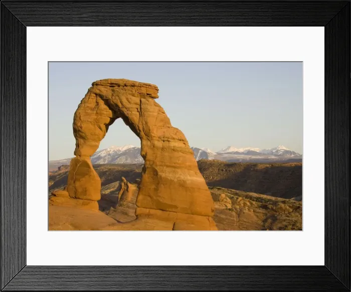 Framed Print : USA - Delicate Arch probably is the most famous sandstone rock sculpture in the Arches National Park. In the background the snow-capped La Sal Mountains. Photographed in spring (April). Arches National Park, Utah, USA Framed Print : USA - Delicate Arch probably is the most famous sandstone rock sculpture in the Arches National Park. In the background the snow-capped La Sal Mountains. Photographed in spring (April). Arches National Park, Utah, USA