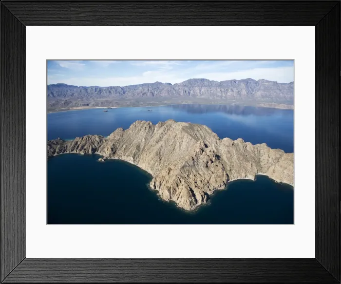 Framed Print : Baja California and Sea of Cortez, Mexico Aerial view of Danzante Island (foreground) and the Baja Peninsula, south of Loreto. The range in the background is known as Sierra de la Giganta Framed Print : Baja California and Sea of Cortez, Mexico Aerial view of Danzante Island (foreground) and the Baja Peninsula, south of Loreto. The range in the background is known as Sierra de la Giganta