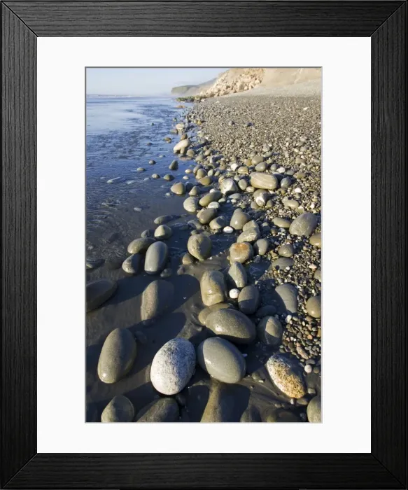 Framed Print : New Zealand - deserted pebble beach at low tide near Punakaiki - South Island Framed Print : New Zealand - deserted pebble beach at low tide near Punakaiki - South Island