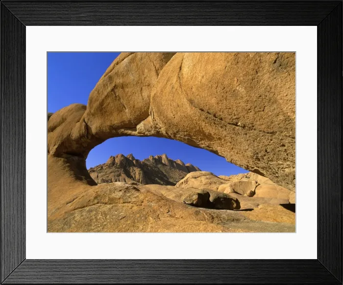 Framed Print : Rock arch Pandock mountains seen through a rock arch of red granite Spitzkoppe area, Namibia, Africa Framed Print : Rock arch Pandock mountains seen through a rock arch of red granite Spitzkoppe area, Namibia, Africa