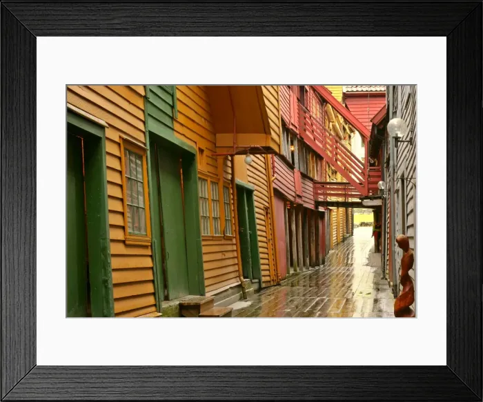 Framed Print : wooden houses alley and colourful historic trade houses in UNESCO world heritage site of Bryggen Bergen, Norway Framed Print : wooden houses alley and colourful historic trade houses in UNESCO world heritage site of Bryggen Bergen, Norway