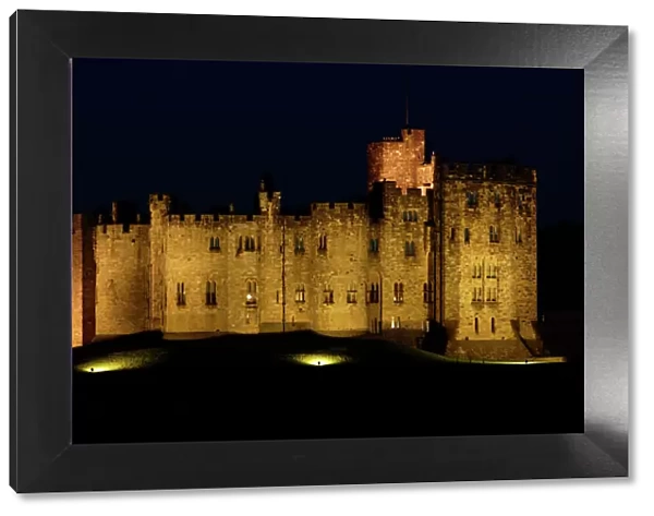 Alnwick Castle-illuminated at night-time, Northumberland UK