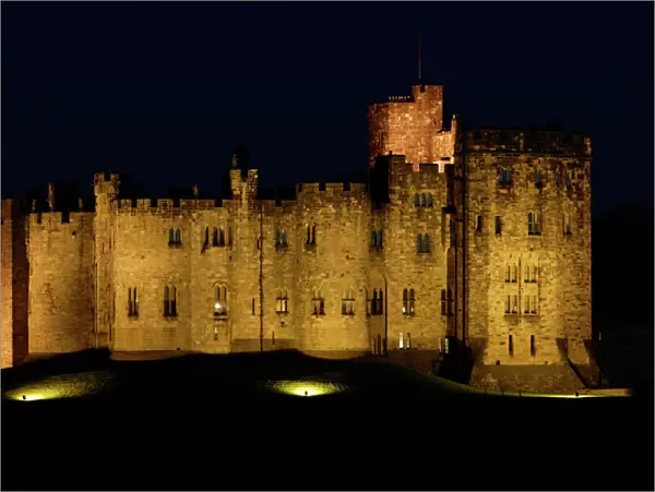 Alnwick Castle-illuminated at night-time, Northumberland UK