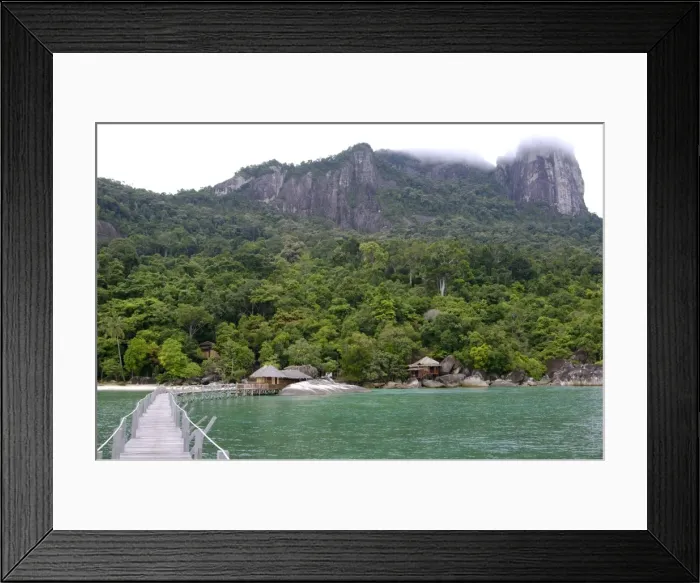 Framed Print : Rainforest, a jetty and a wooden cabins of the Bagus Place Retreat - a small private resort, on the shore of volcanic Tioman Island, 30 km east off peninsula Malaysia in South China Sea; June. Ma39. 3543 Framed Print : Rainforest, a jetty and a wooden cabins of the Bagus Place Retreat - a small private resort, on the shore of volcanic Tioman Island, 30 km east off peninsula Malaysia in South China Sea; June. Ma39. 3543