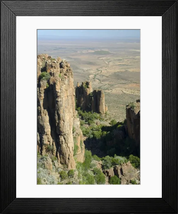 Framed Print : Dolerite pillars, part of a dolerite sill, up to 120 m high standing sentinel over surrounding Great Karoo plains. Valley of Desolation, Camdeboo National Park, Eastern Cape, South Africa Framed Print : Dolerite pillars, part of a dolerite sill, up to 120 m high standing sentinel over surrounding Great Karoo plains. Valley of Desolation, Camdeboo National Park, Eastern Cape, South Africa