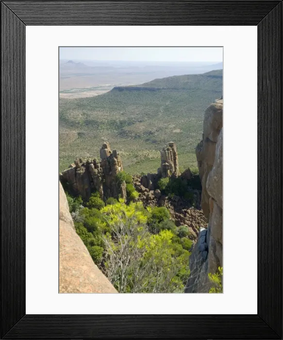 Framed Print : Dolerite pillars, part of a dolerite sill, up to 120 m high standing sentinel over surrounding Great Karoo plains. Valley of Desolation, Camdeboo National Park, Eastern Cape, South Africa