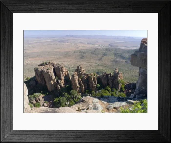 Framed Print : Dolerite pillars, part of a dolerite sill, up to 120 m high standing sentinel over surrounding Great Karoo plains. Valley of Desolation, Camdeboo National Park, Eastern Cape, South Africa Framed Print : Dolerite pillars, part of a dolerite sill, up to 120 m high standing sentinel over surrounding Great Karoo plains. Valley of Desolation, Camdeboo National Park, Eastern Cape, South Africa