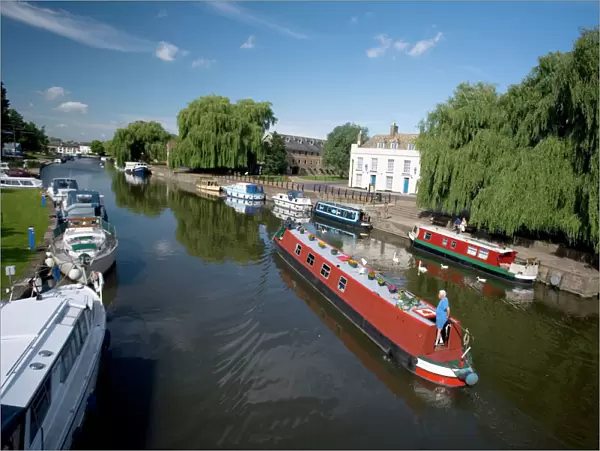 Canal boats on The River Ouse - Ely - Cambridgeshire - England - UK
