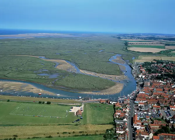 UK - aerial of Wells-next-the-sea, salt marsh landscape & coastline at low tide. Norfolk, UK