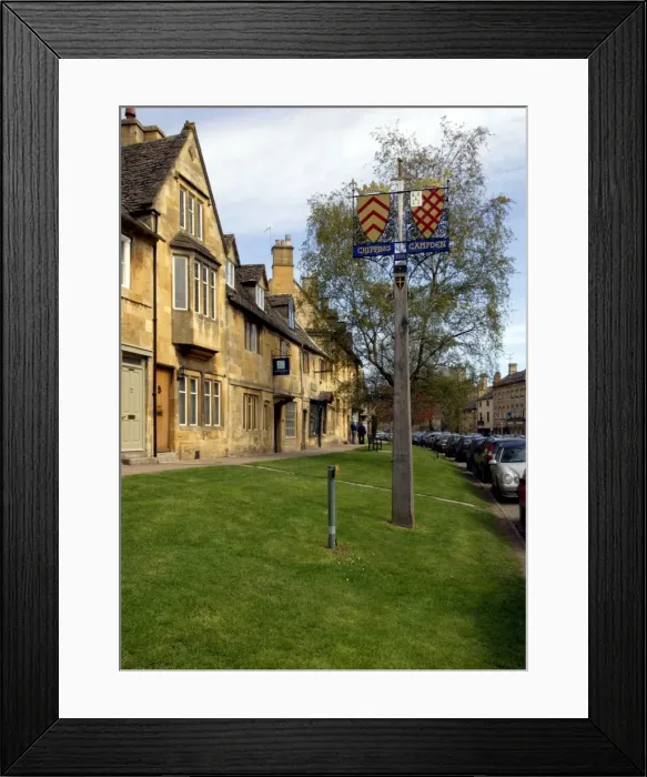 Framed Print : England - Chipping Campden High Street, always very busy with visitors and tourists. April. UK Framed Print : England - Chipping Campden High Street, always very busy with visitors and tourists. April. UK