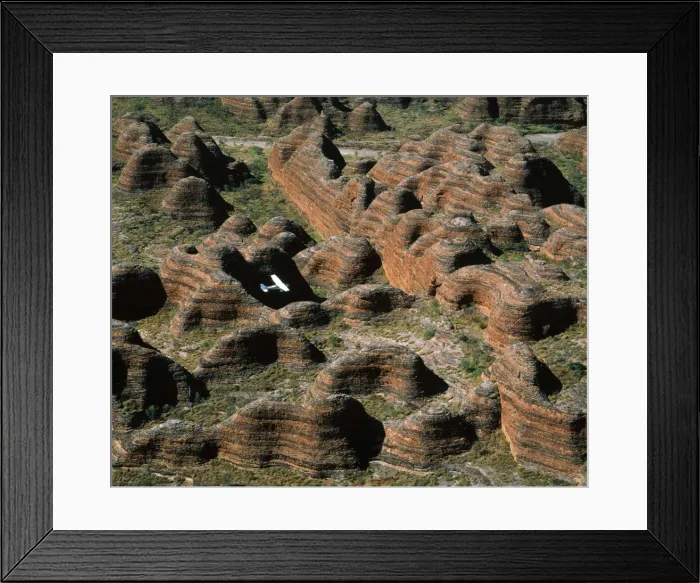Framed Print : Western Australia Pumululu National Park Bungle Bungle Range. Sandstone range formed 400 million years ago from layered sediments washed into a rift valley. Eroded into beehive formations & deep canyon-type valleys Framed Print : Western Australia Pumululu National Park Bungle Bungle Range. Sandstone range formed 400 million years ago from layered sediments washed into a rift valley. Eroded into beehive formations & deep canyon-type valleys