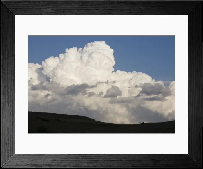 Framed Print : Low altitude billowing cumulus clouds on horizon looming above dark foreground Northern Spain Framed Print : Low altitude billowing cumulus clouds on horizon looming above dark foreground Northern Spain