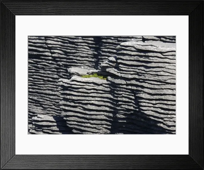 Framed Print : Limestone outcrops on cliffs. Punakaiki - South Island - New Zealand. Pancake rocks form the main focus for visitors in Paparoa National Park where huge outcrops of limestone have been formed by a process called stylobedding Framed Print : Limestone outcrops on cliffs. Punakaiki - South Island - New Zealand. Pancake rocks form the main focus for visitors in Paparoa National Park where huge outcrops of limestone have been formed by a process called stylobedding