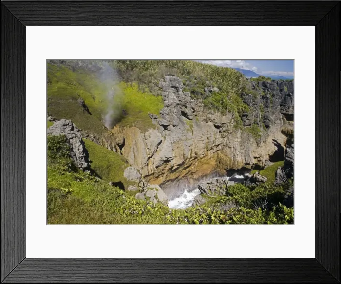 Framed Print : Limestone outcrops on cliffs. Punakaiki - South Island - New Zealand. Pancake rocks form the main focus for visitors in Paparoa National Park where huge outcrops of limestone have been formed by a process called stylobedding Framed Print : Limestone outcrops on cliffs. Punakaiki - South Island - New Zealand. Pancake rocks form the main focus for visitors in Paparoa National Park where huge outcrops of limestone have been formed by a process called stylobedding