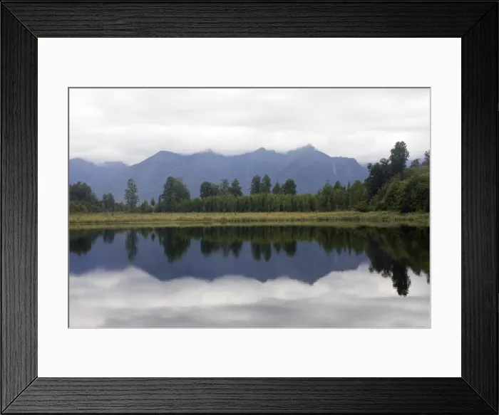 Framed Print : New Zealand - Reflections of southern alps in Lake Matheson - South Westland - South Island Framed Print : New Zealand - Reflections of southern alps in Lake Matheson - South Westland - South Island
