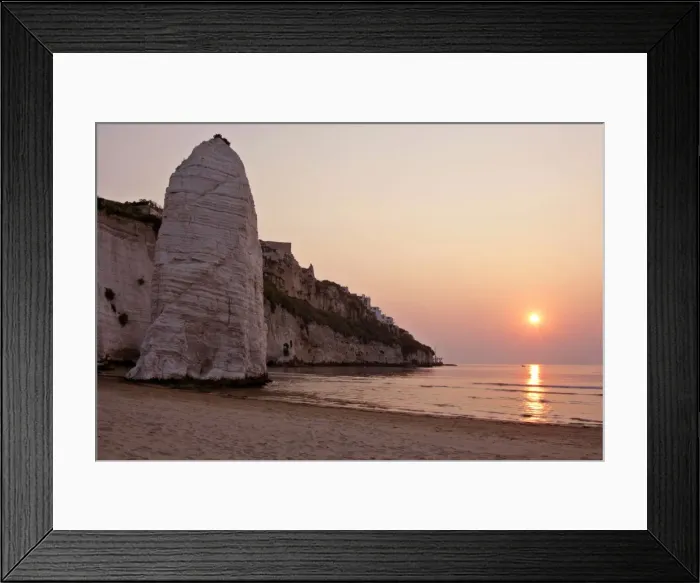 Framed Print : Beach of Vieste with chalk cliffs and symbol Pizzomunno at sunrise Gargano Peninsula, Italy Framed Print : Beach of Vieste with chalk cliffs and symbol Pizzomunno at sunrise Gargano Peninsula, Italy