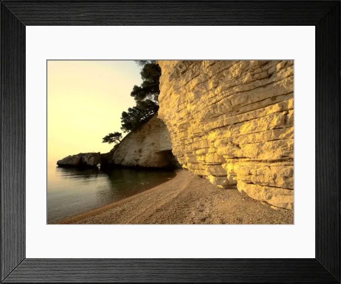 Framed Print : Calm bay with chalk cliffs and gravel beach Gargano Peninsula, Italy Framed Print : Calm bay with chalk cliffs and gravel beach Gargano Peninsula, Italy