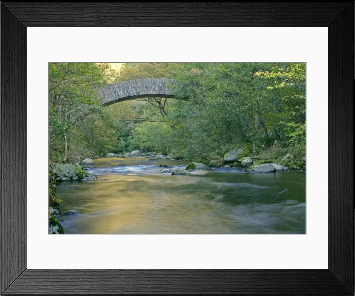 Framed Print : Watersmeet historic bridge spanning river with autumn colour reflections Watersmeet, Exmoor National Park, Devon, England, UK Framed Print : Watersmeet historic bridge spanning river with autumn colour reflections Watersmeet, Exmoor National Park, Devon, England, UK