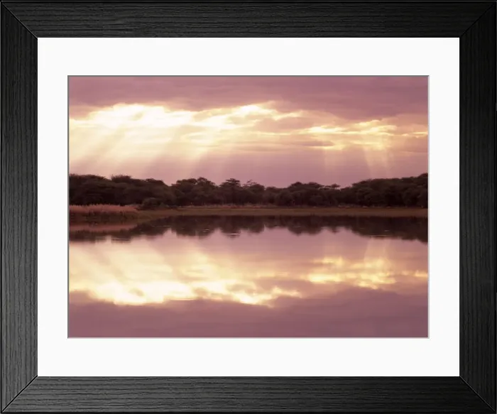 Framed Print : Morning mood sun beams breaking through clouds at a lake with reflection Mount Etjo, Namibia, Africa Framed Print : Morning mood sun beams breaking through clouds at a lake with reflection Mount Etjo, Namibia, Africa