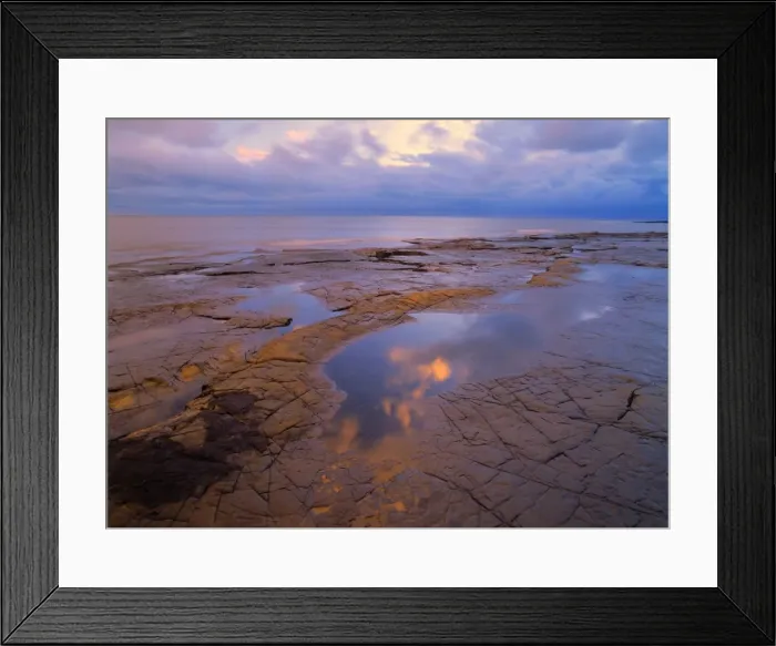 Framed Print : Coastal scenery rocky ledges and ocean at Kimmeridge Bay in soft afternoon light Kimmeridge Bay, Jurassic Coast, Dorset, England, UK Framed Print : Coastal scenery rocky ledges and ocean at Kimmeridge Bay in soft afternoon light Kimmeridge Bay, Jurassic Coast, Dorset, England, UK