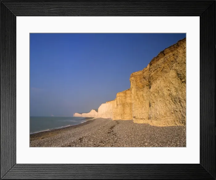 Framed Print : Chalk cliffs coastline with beach and chalk cliffs of the Seven Sisters seen from Birling Gap Birling Gap, Sussex Downs, East Sussex, England, UK Framed Print : Chalk cliffs coastline with beach and chalk cliffs of the Seven Sisters seen from Birling Gap Birling Gap, Sussex Downs, East Sussex, England, UK