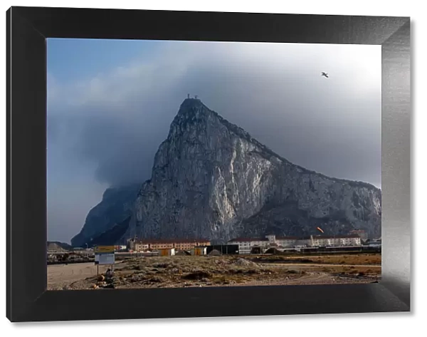 Gibraltar - Rock of Gibraltar with Levante  /  East Wind Strait of Gibraltar - Spain. Due to the levante, Gibraltar is often covered by cloud