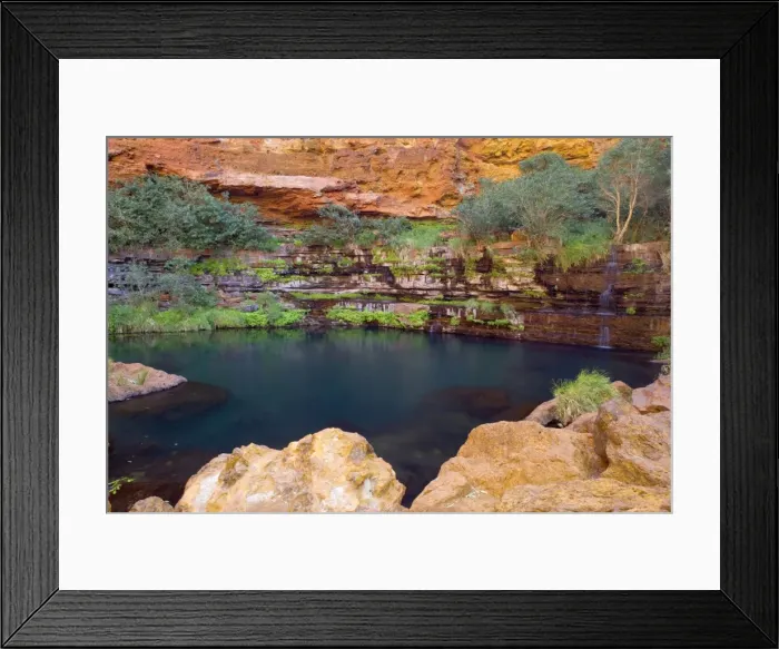 Framed Print : Circular Pool - water cascades down a steep, heavily with fern covered, terraced canyon wall into picturesque Circular Pool. The dark turquoise coloured water contrasts nicely with the bright red canyon walls Framed Print : Circular Pool - water cascades down a steep, heavily with fern covered, terraced canyon wall into picturesque Circular Pool. The dark turquoise coloured water contrasts nicely with the bright red canyon walls
