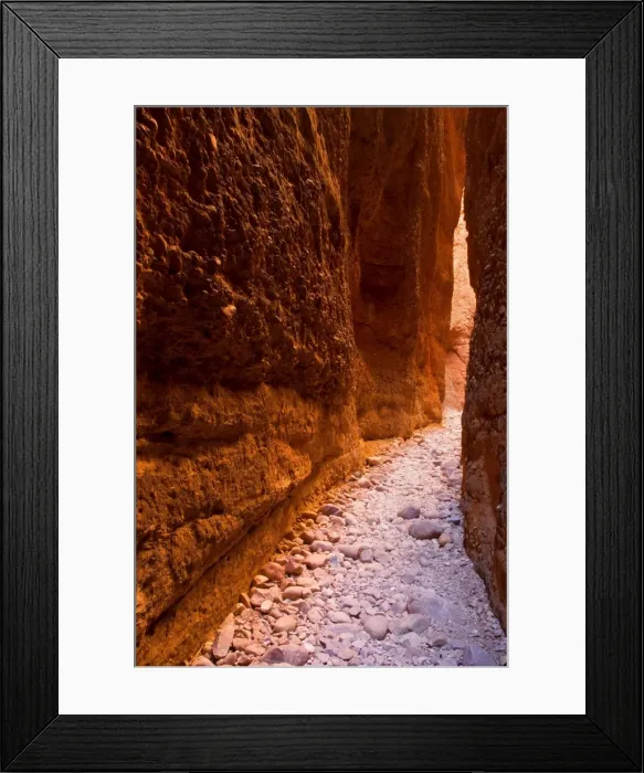 Framed Print : Echidna Chasm - a very narrow, enchanting slot canyon which is partly only one metre wide. When the sun is high, it reflects on the walls and creates varying colour hues from nearly white to yellow to dark red - Bungle Bungle National Park Framed Print : Echidna Chasm - a very narrow, enchanting slot canyon which is partly only one metre wide. When the sun is high, it reflects on the walls and creates varying colour hues from nearly white to yellow to dark red - Bungle Bungle National Park