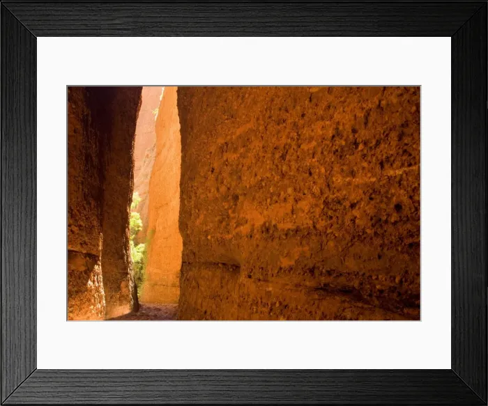 Framed Print : Echidna Chasm - a very narrow, enchanting slot canyon which is partly only one metre wide. When the sun is high, it reflects on the walls and creates varying colour hues from nearly white to yellow to dark red - Bungle Bungle National Park Framed Print : Echidna Chasm - a very narrow, enchanting slot canyon which is partly only one metre wide. When the sun is high, it reflects on the walls and creates varying colour hues from nearly white to yellow to dark red - Bungle Bungle National Park