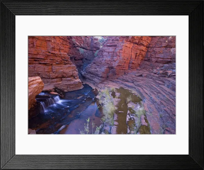 Framed Print : Hancock Gorge - a stream is flowing down Hancock Gorge, surrounded by steep, red and very terraced cliffs. This rather wide and very winded section is aptly named the Amphitheatre Framed Print : Hancock Gorge - a stream is flowing down Hancock Gorge, surrounded by steep, red and very terraced cliffs. This rather wide and very winded section is aptly named the Amphitheatre