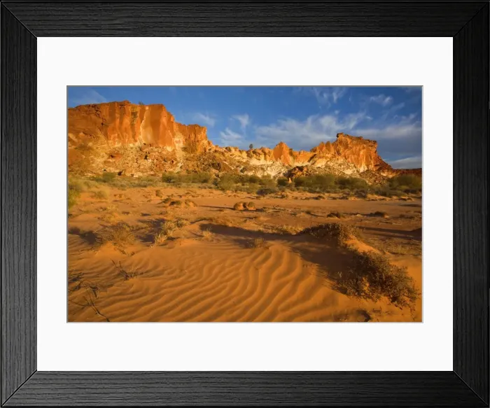 Framed Print : Rainbow Valley - colourful rock formation with bands of different coloured sandstone, from yellow to orange and rusty brown, ablaze in late evening light - Rainbow Valley, Simpson Desert area, Northern Territory, Australia Framed Print : Rainbow Valley - colourful rock formation with bands of different coloured sandstone, from yellow to orange and rusty brown, ablaze in late evening light - Rainbow Valley, Simpson Desert area, Northern Territory, Australia