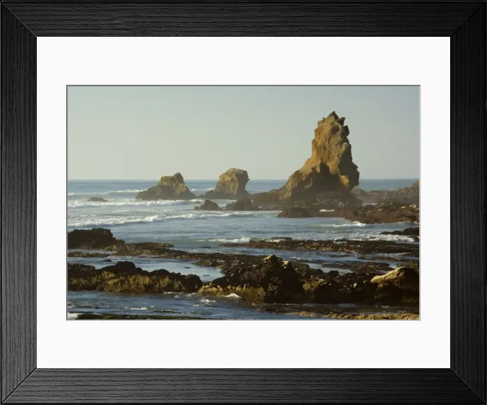 Framed Print : Coastline rock formations ragged sea stacks and rock formations at the coastline just north of Punakaiki Paparoa National Park, West Coast, South Island, New Zealand