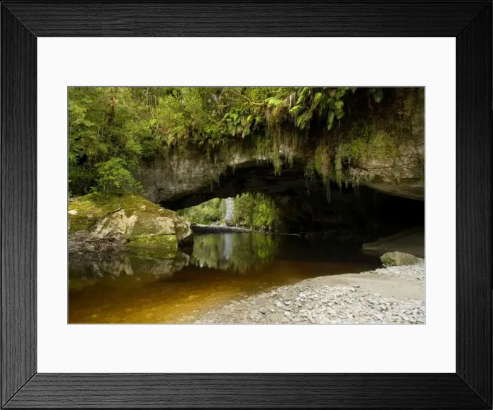 Framed Print : Moria Gate Arch and picturesque Oparara river located amidst lush and untouched native rainforest Oparara Basin, Karamea region, West Coast, South Island, New Zealand Framed Print : Moria Gate Arch and picturesque Oparara river located amidst lush and untouched native rainforest Oparara Basin, Karamea region, West Coast, South Island, New Zealand