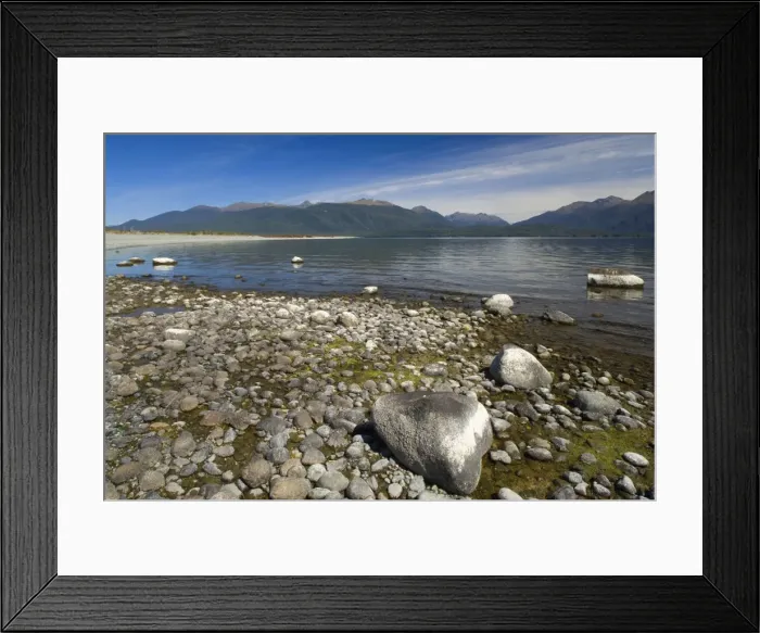 Framed Print : Lake Te Anau shores of beautiful and calm lake Te Anau surrounded by mountains Te Anau, Fjordland National Park, South Island, New Zealand Framed Print : Lake Te Anau shores of beautiful and calm lake Te Anau surrounded by mountains Te Anau, Fjordland National Park, South Island, New Zealand