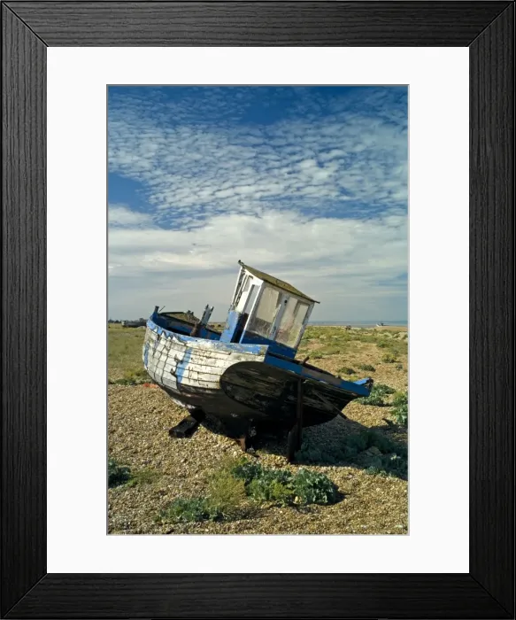 Framed Print : Abandoned Boat on shore - Dungeness, Kent. The beach at Dungeness looks like a dumping ground, but geologists are fascinated by the action of tides and wind on this extreme corner of Kent Framed Print : Abandoned Boat on shore - Dungeness, Kent. The beach at Dungeness looks like a dumping ground, but geologists are fascinated by the action of tides and wind on this extreme corner of Kent