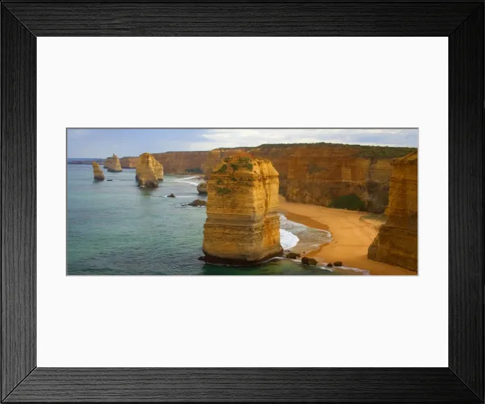 Framed Print : Twelve Apostles - morning at the sandstone rock formations of famous Twelve Apostels, which are sculpted by the relentless sea. The force of the sea eats more and more of the rocks away Framed Print : Twelve Apostles - morning at the sandstone rock formations of famous Twelve Apostels, which are sculpted by the relentless sea. The force of the sea eats more and more of the rocks away