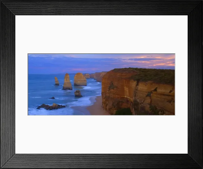 Framed Print : Twelve Apostles sunset - sandstone rock formations of famous Twelve Apostels, which are sculpted by the relentless sea, just before sunrise. The force of the sea eats more and more of the rocks away and finally forces them to collapse Framed Print : Twelve Apostles sunset - sandstone rock formations of famous Twelve Apostels, which are sculpted by the relentless sea, just before sunrise. The force of the sea eats more and more of the rocks away and finally forces them to collapse