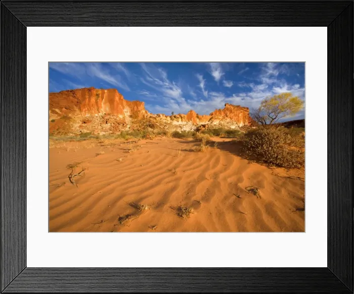 Framed Print : Rainbow Valley - colourful rock formation with bands of different coloured sandstone, from yellow to orange and rusty brown, ablaze in late evening light - Rainbow Valley, Simpson Desert area, Northern Territory, Australia Framed Print : Rainbow Valley - colourful rock formation with bands of different coloured sandstone, from yellow to orange and rusty brown, ablaze in late evening light - Rainbow Valley, Simpson Desert area, Northern Territory, Australia